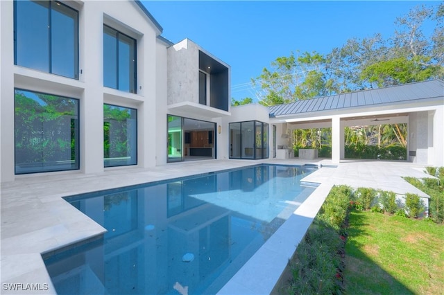 view of pool featuring a patio and a gazebo