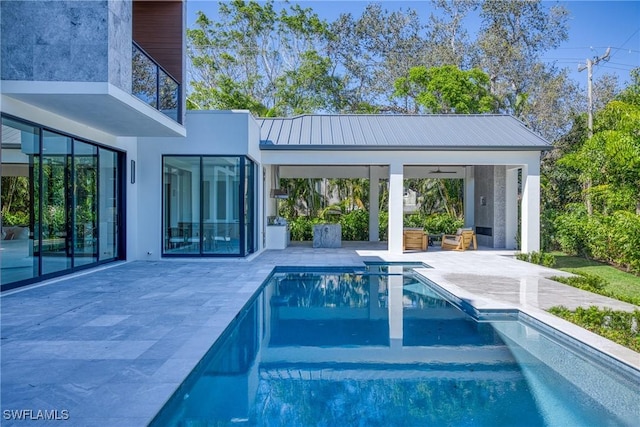 pool with a patio