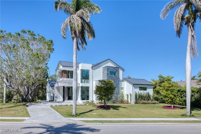 view of property with driveway