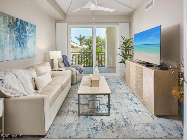 living room featuring ceiling fan