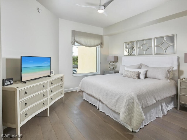 bedroom with ceiling fan and wood-type flooring