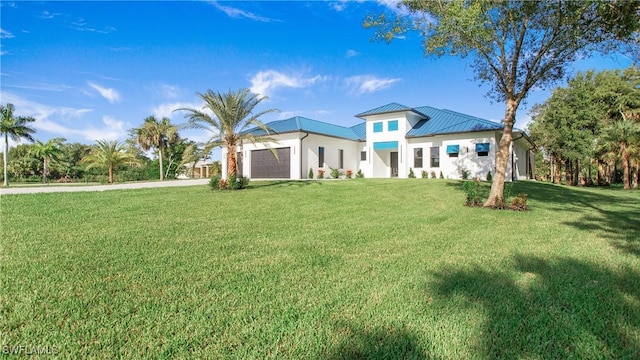 exterior space featuring a yard and a garage