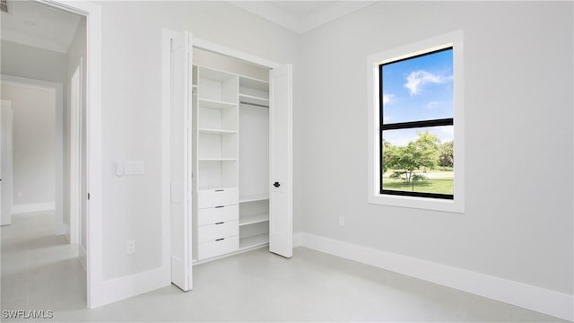 unfurnished bedroom featuring ornamental molding