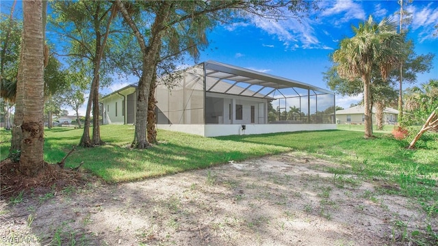 view of yard featuring a lanai