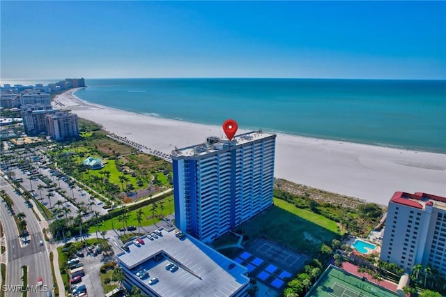 aerial view featuring a view of the beach and a water view