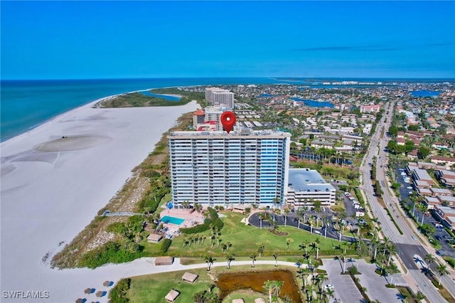 aerial view featuring a water view and a view of the beach