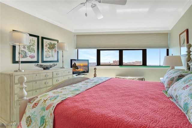 bedroom with ceiling fan and crown molding