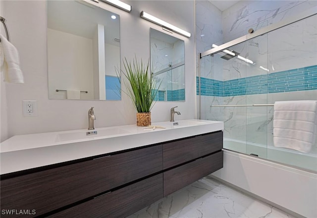 bathroom with enclosed tub / shower combo and vanity