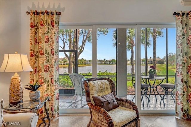 sunroom / solarium with a water view