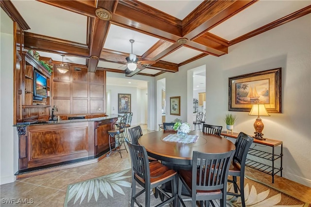 tiled dining area with beamed ceiling, ceiling fan, and coffered ceiling