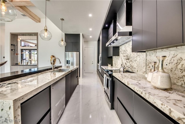 kitchen featuring appliances with stainless steel finishes, decorative light fixtures, decorative backsplash, beam ceiling, and wall chimney exhaust hood