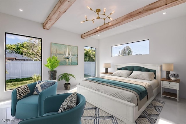 bedroom with beam ceiling, concrete floors, and a notable chandelier