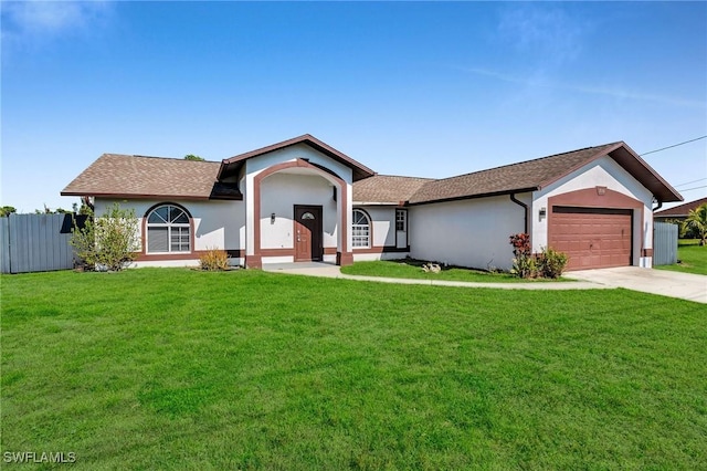 ranch-style home with a front lawn and a garage