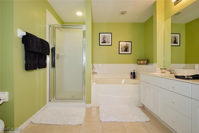 bathroom featuring tile patterned floors, separate shower and tub, and vanity