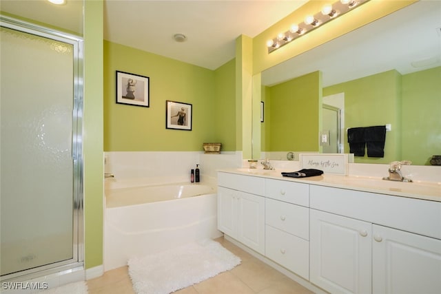 bathroom featuring vanity, tile patterned floors, and independent shower and bath