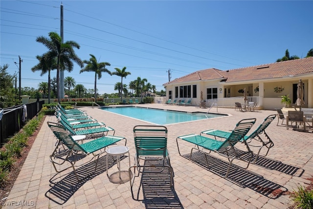 view of pool featuring a patio