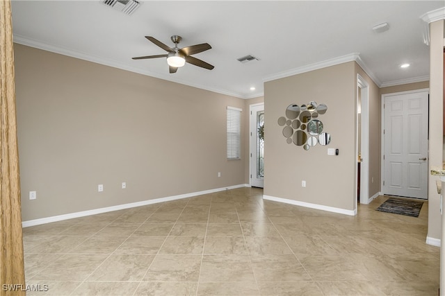 unfurnished room with visible vents, baseboards, and ornamental molding