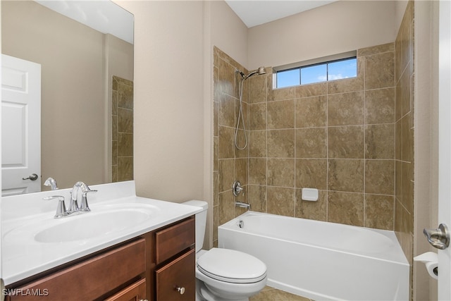 bathroom featuring tub / shower combination, toilet, and vanity