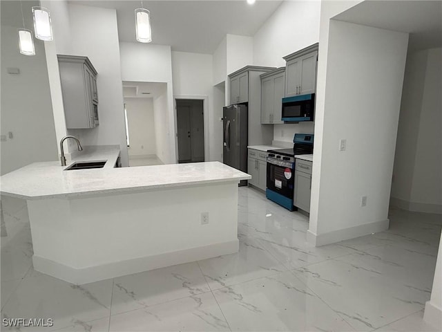 kitchen with stainless steel fridge, black range with electric cooktop, gray cabinetry, and sink