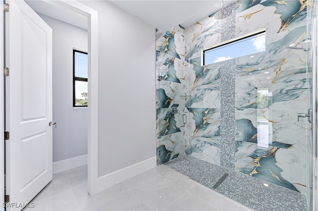 bathroom with a wealth of natural light and an enclosed shower