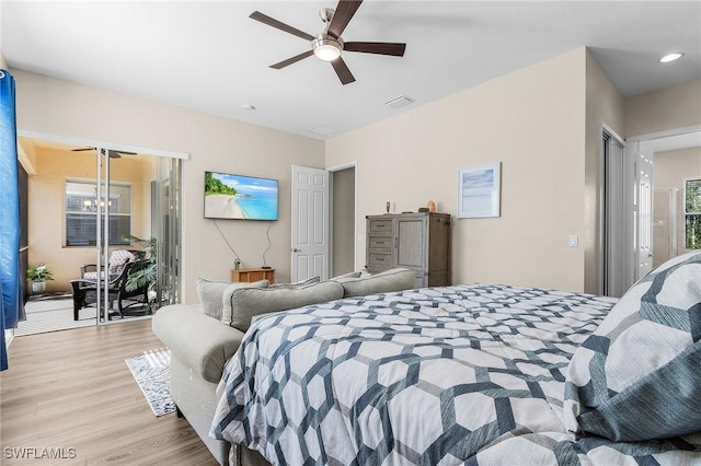 bedroom with ceiling fan and light wood-type flooring