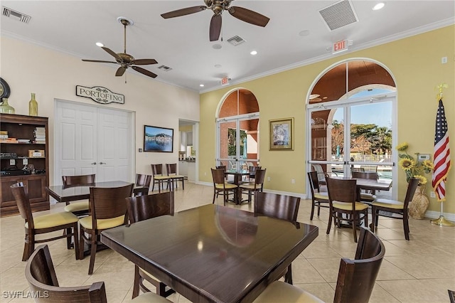 dining room with ceiling fan, french doors, ornamental molding, and light tile patterned floors