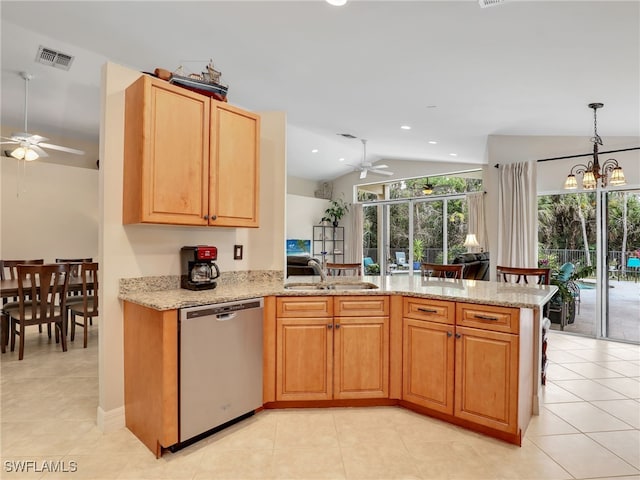 kitchen with lofted ceiling, sink, light stone countertops, stainless steel dishwasher, and kitchen peninsula