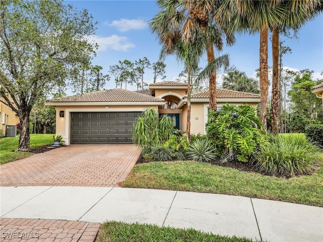 mediterranean / spanish-style house featuring a garage