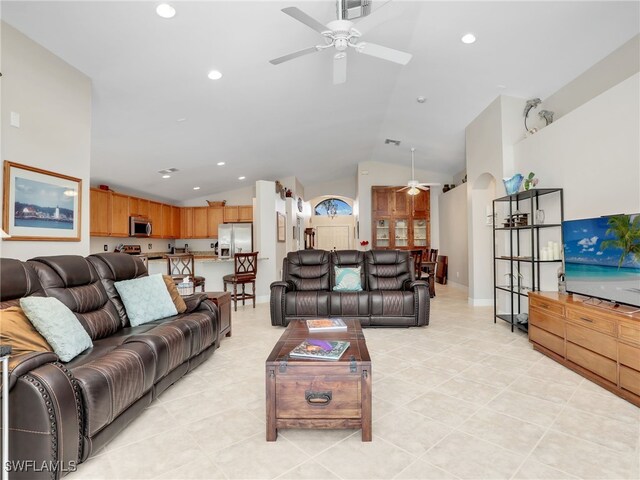 living room featuring vaulted ceiling, recessed lighting, ceiling fan, and light tile patterned flooring