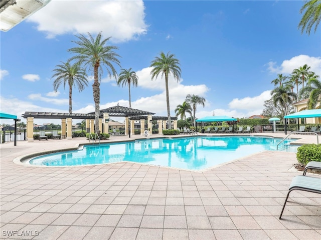 view of swimming pool with a gazebo, a patio area, and a pergola