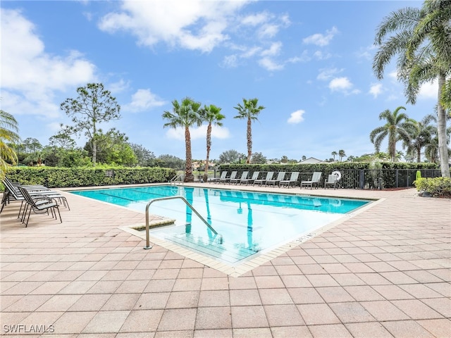 view of swimming pool featuring a patio