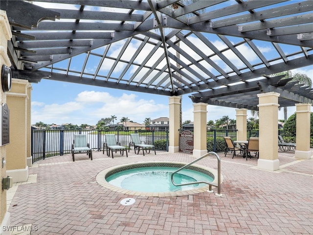 view of pool featuring a pergola, a patio area, and a hot tub