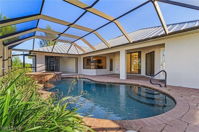 view of pool featuring a lanai and a patio area