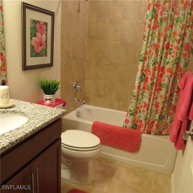 full bathroom with tile patterned flooring, vanity, shower / bath combination with curtain, and toilet