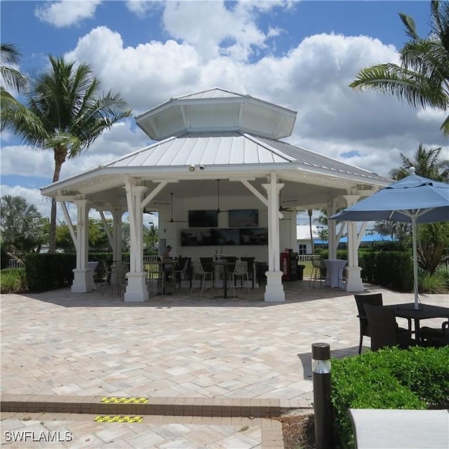 view of property's community featuring a gazebo and a patio