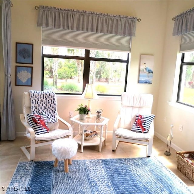 sitting room with tile patterned floors