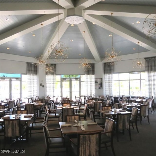 8874 Horned Lark Dr, Naples, FL 34120 - dining space with beamed ceiling, high vaulted ceiling, a healthy amount of sunlight, and a notable chandelier