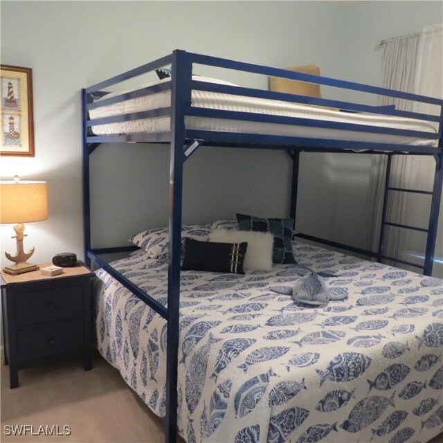 8874 Horned Lark Dr, Naples, FL 34120 - bedroom with carpet flooring