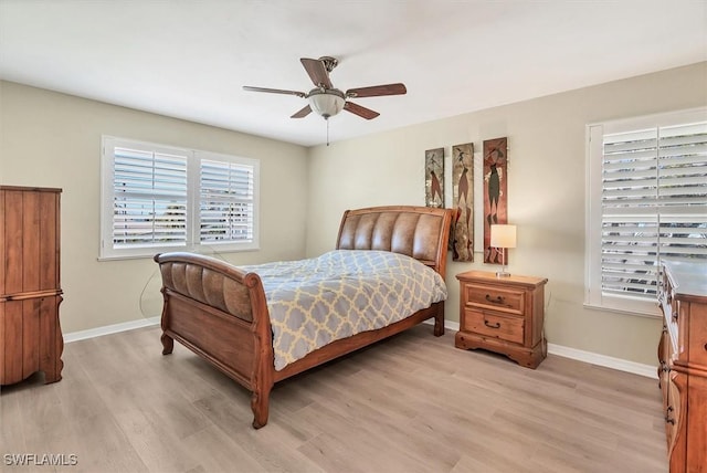 bedroom featuring ceiling fan and light wood-type flooring