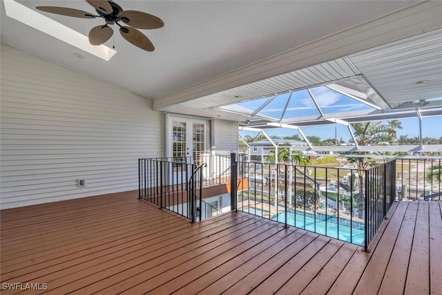 wooden deck featuring ceiling fan