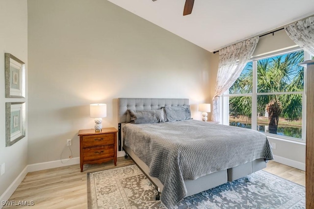 bedroom with light hardwood / wood-style floors and ceiling fan