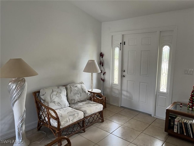 tiled foyer entrance featuring plenty of natural light