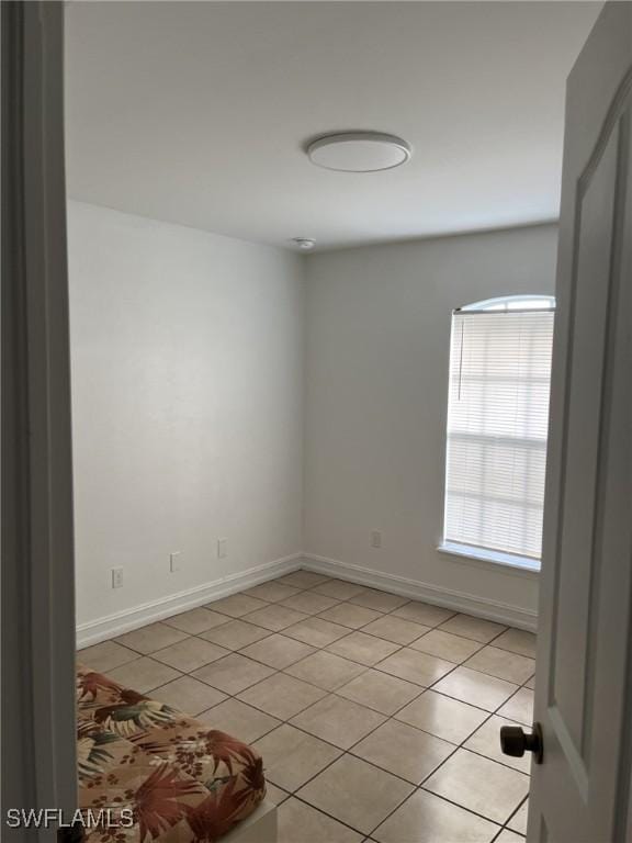 view of tiled spare room