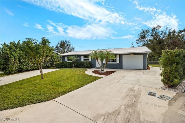 single story home with a front yard and a garage