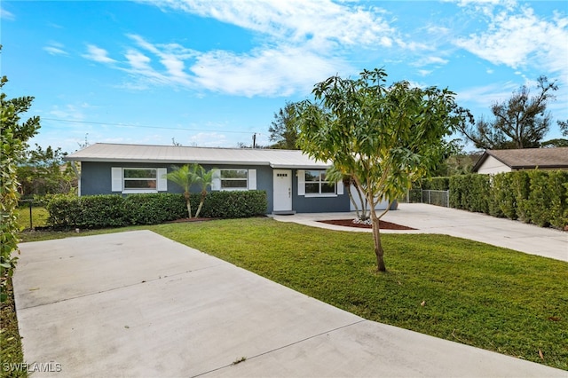 view of front of house with a front lawn