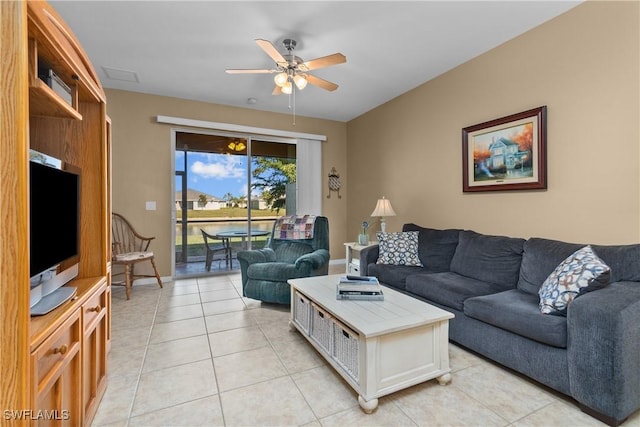 living room with light tile patterned floors and ceiling fan