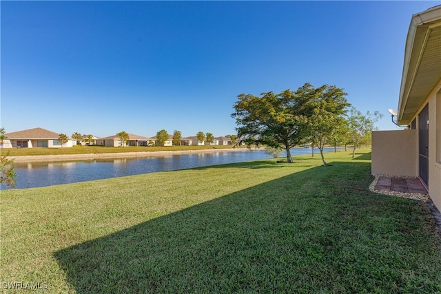 view of yard with a water view