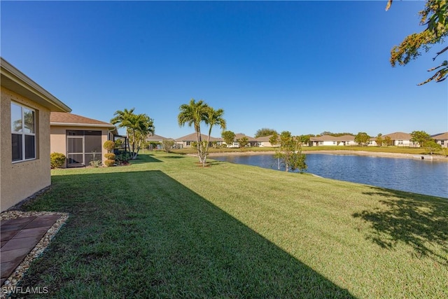 view of yard with a water view