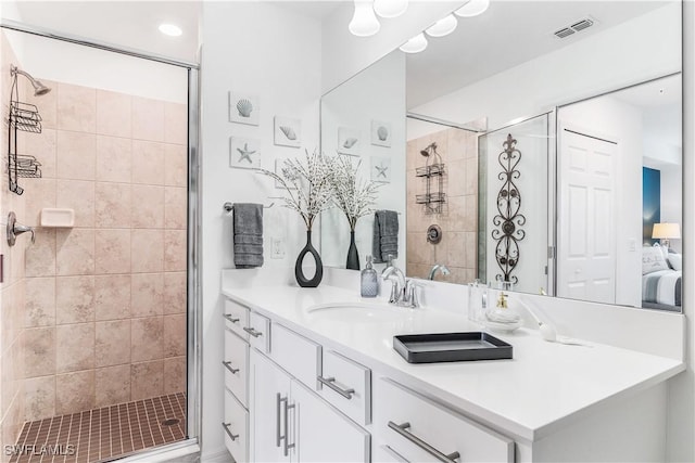 bathroom with vanity and walk in shower