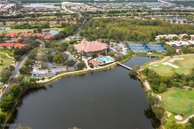 aerial view with a water view and view of golf course